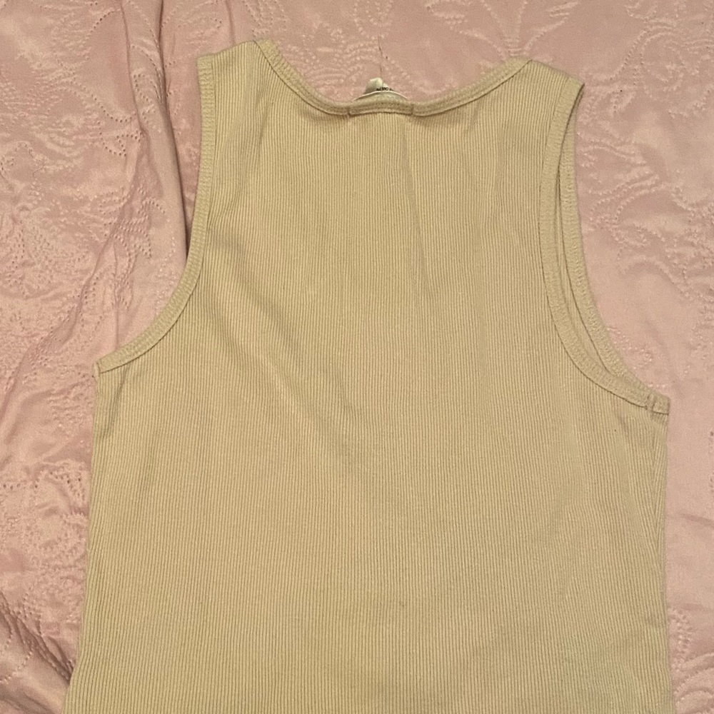 A cream tank top